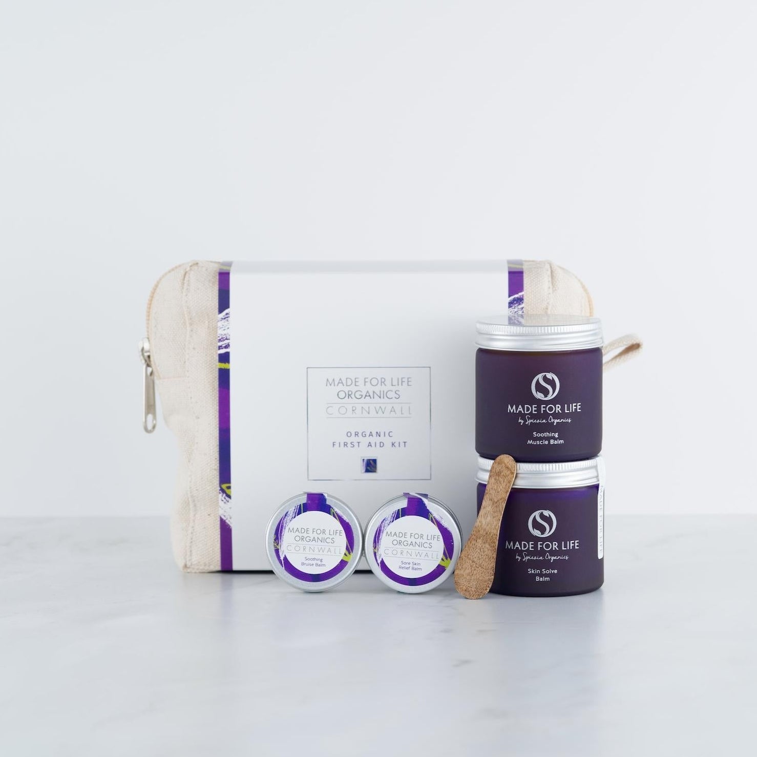 Organic First Aid Kit from Made For Life Organics, front shot of bag, 2 x 10ml tins and 2 x 50ml jars, all purple